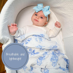 LollyBanks soft cotton muslin swaddle blanket feels gentle against baby's skin.