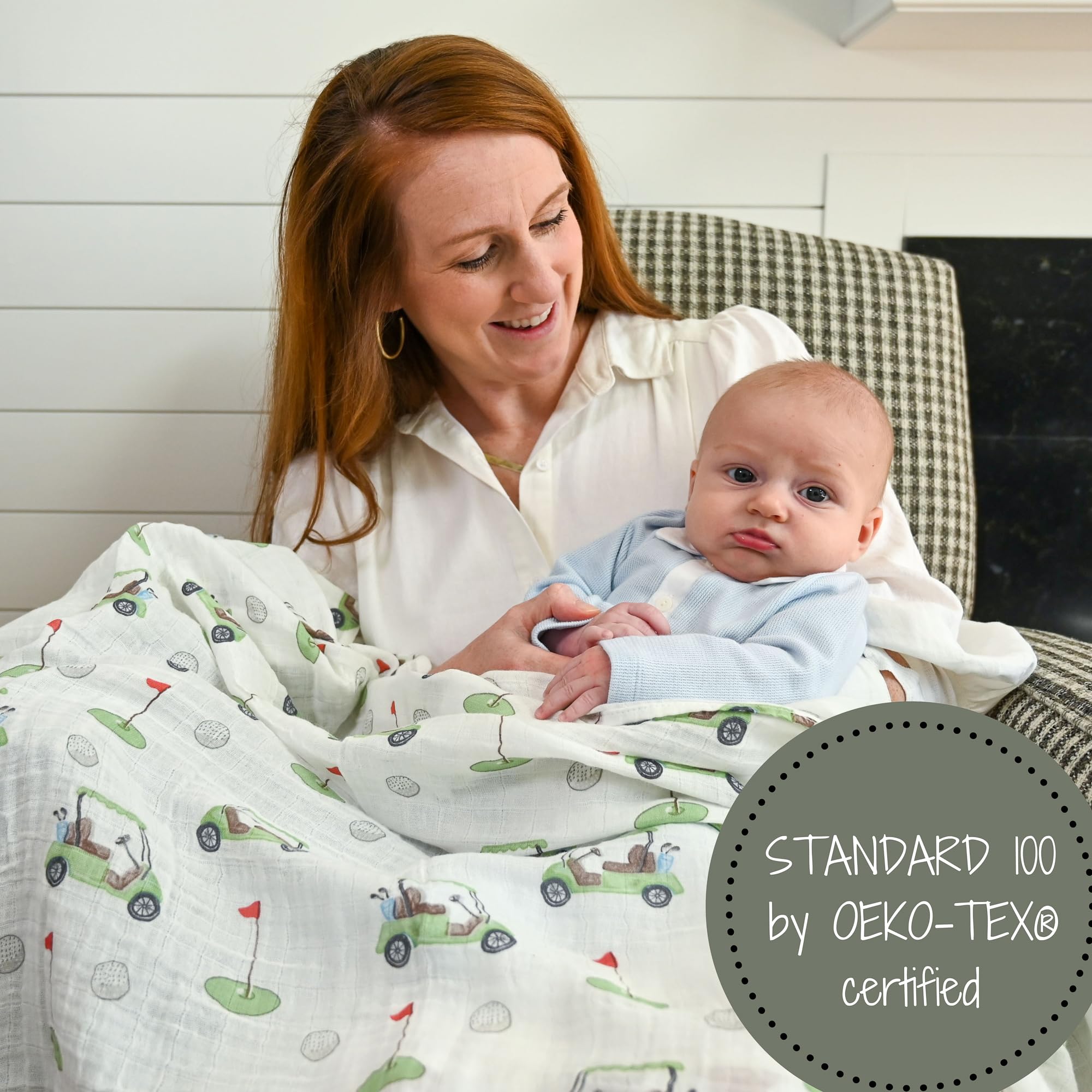 LollyBanks golf-print swaddle on crib as nursery decor