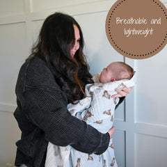 LollyBanks tiger cub swaddle in diaper bag for burp cloth use.