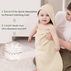 Looxii hooded towel detail emphasizes cozy hood keeping baby's head warm