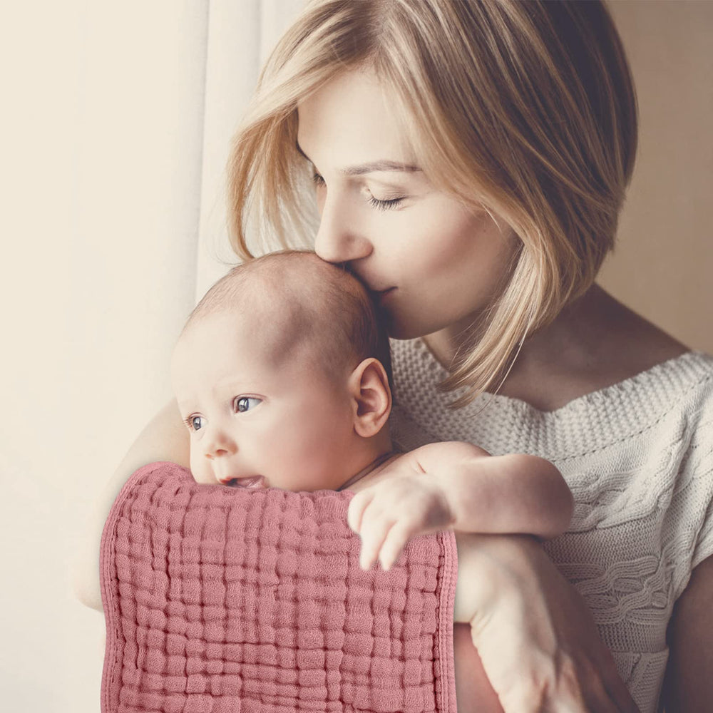 Looxii burp cloths six-layer absorbency ideal for spit-up and drool messes.