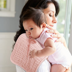 Looxii Muslin Burp Cloths 6-layer absorbency — quickly soaks drool and spit-up.