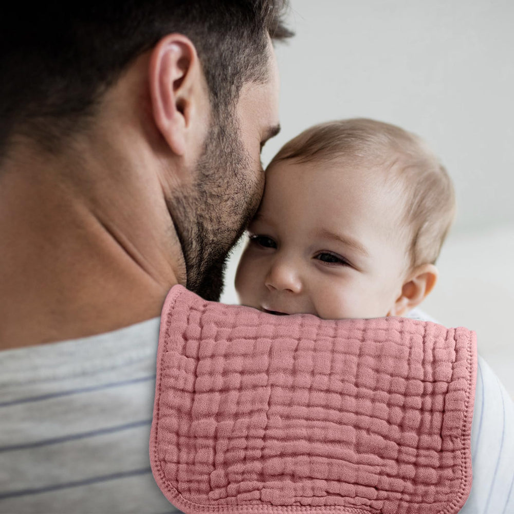 Looxii Muslin Burp Cloths shoulder coverage — oversized cloth guards clothes during burping.