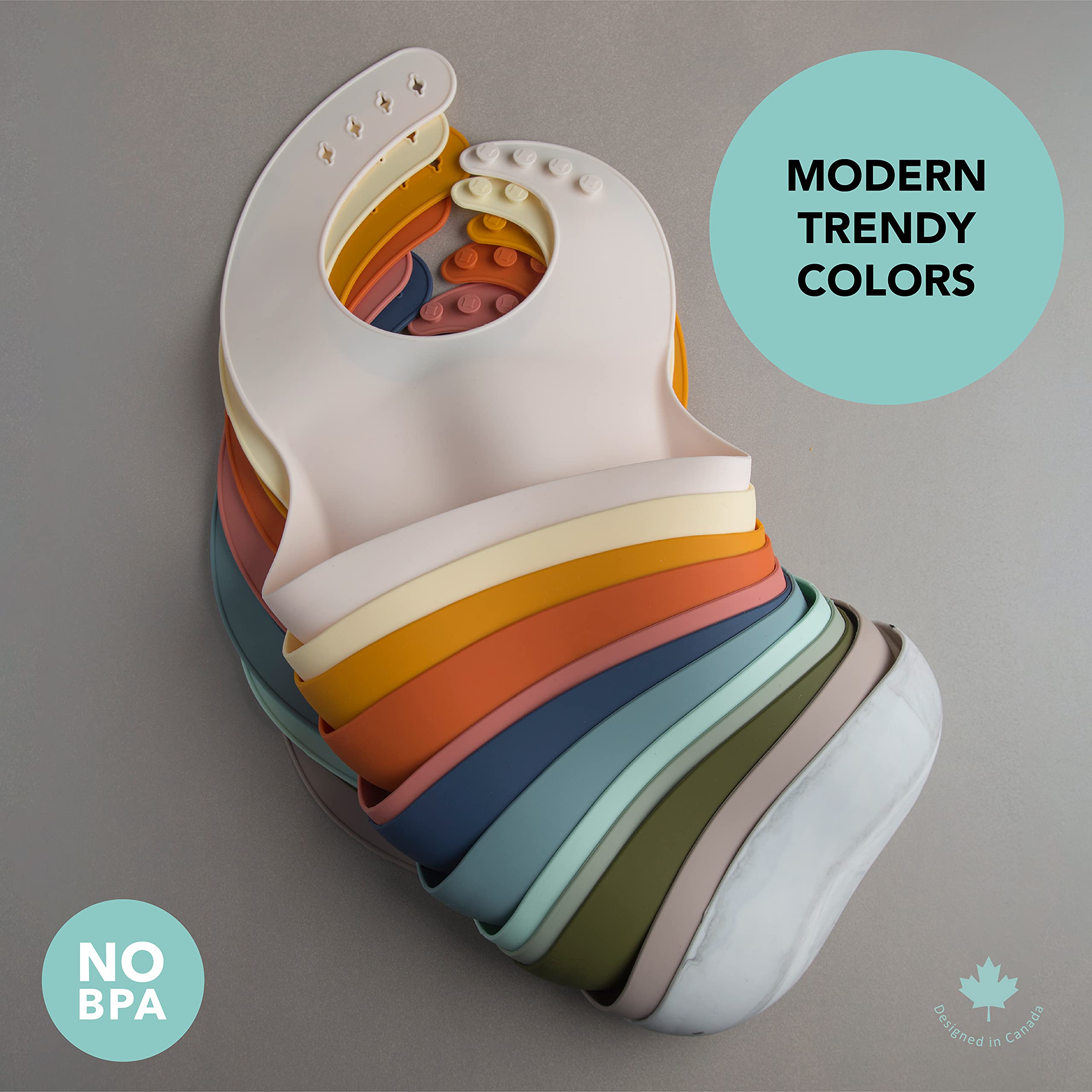 Loulou Lollipop bib Coconut Cream beside colorful foods for meal-time compatibility.