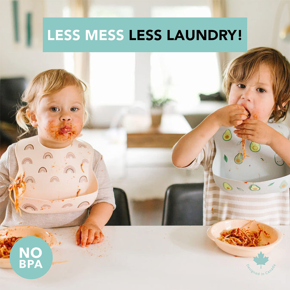 Loulou Lollipop bib dining-scene with baby and toddler helps mess management.