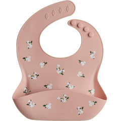 Loulou Lollipop soft silicone bib close-up highlights waterproof, stain-resistant fabric for quick wipe-down.