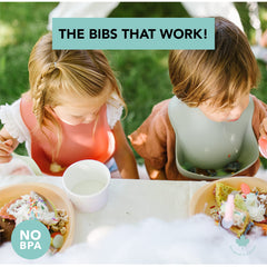 Loulou Lollipop silicone bib travel-roll-up design for easy on-the-go feeding.