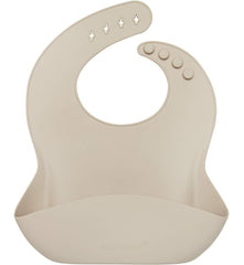 Loulou Lollipop waterproof silicone bib sand close-up shows soft, stain-resistant material for easy cleaning.