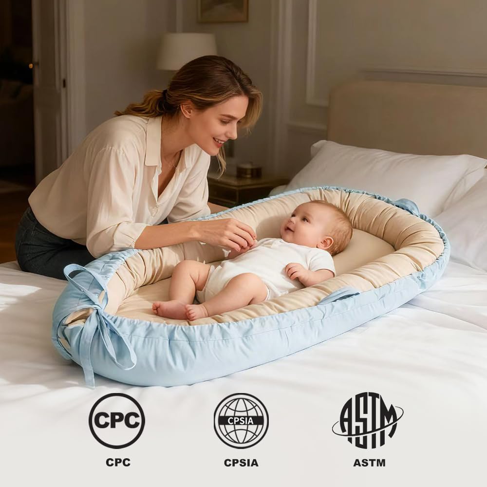 Love Mage baby lounger blue side view: breathable cotton supporting cozy, awake-time lounging.