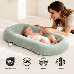 LOVE MAGE infant lounger with waterproof inner surface for easy spill cleanup.