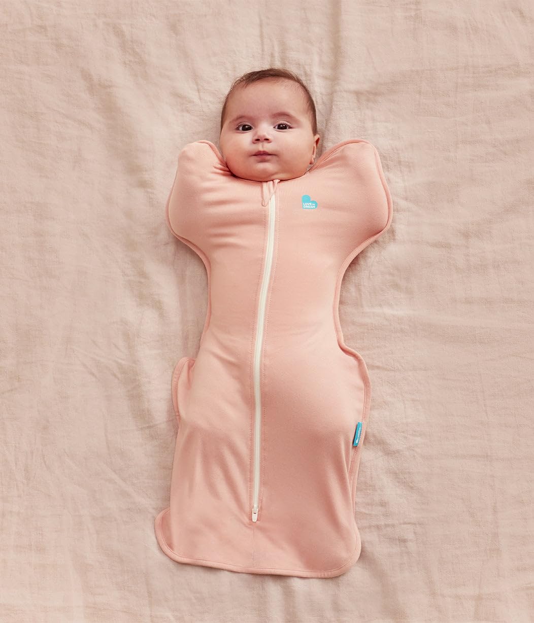 Love to Dream Swaddle Up Blush arms near face promotes comforting self-soothing and soothing sleep.
