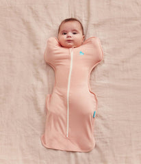 Love to Dream Swaddle Up Blush arms near face promotes comforting self-soothing and soothing sleep.