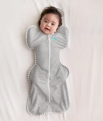Love to Dream Swaddle UP gray arm-position demo shows arms up comfort.