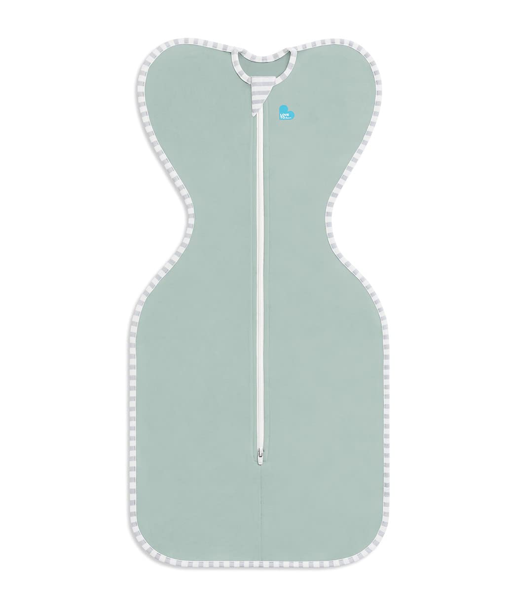 Love to Dream Swaddle Up Olive baby sleeping scene highlights calm rest.