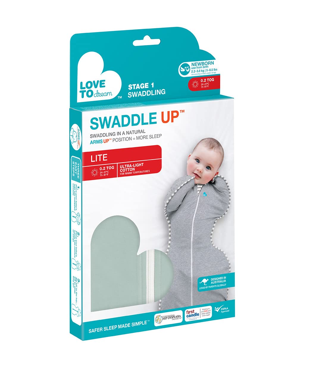 Love to Dream Swaddle Up Olive in-bed scene shows snug, safe sleep setup.