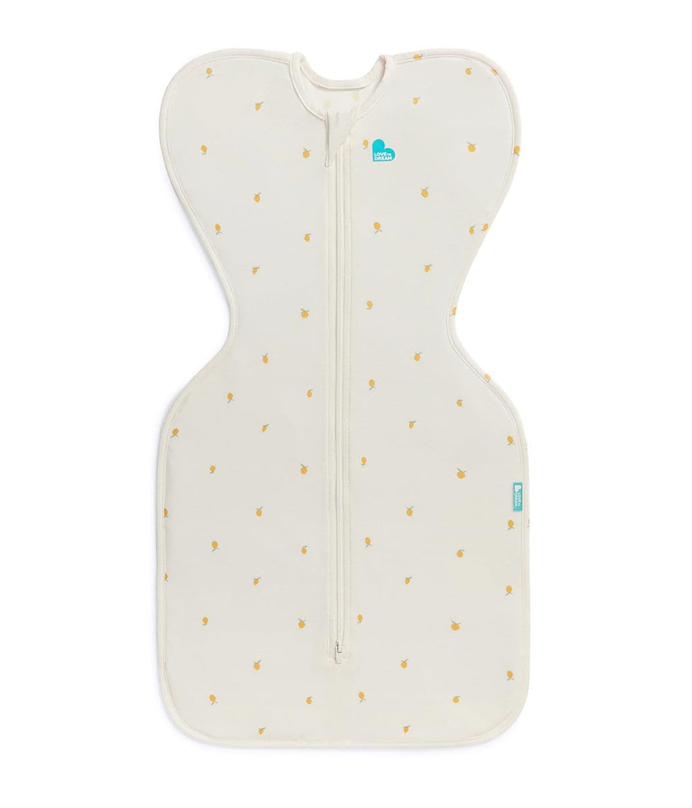 Love To Dream Swaddle Up Silky-Lux 1.0 Tog in Cream Lemons for arms-up self-soothing sleep.