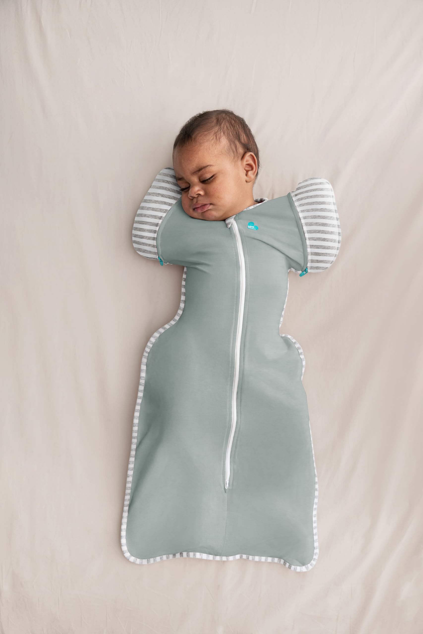 Love to Dream Swaddle Up Transition arm-free swaddle supports growing babies.