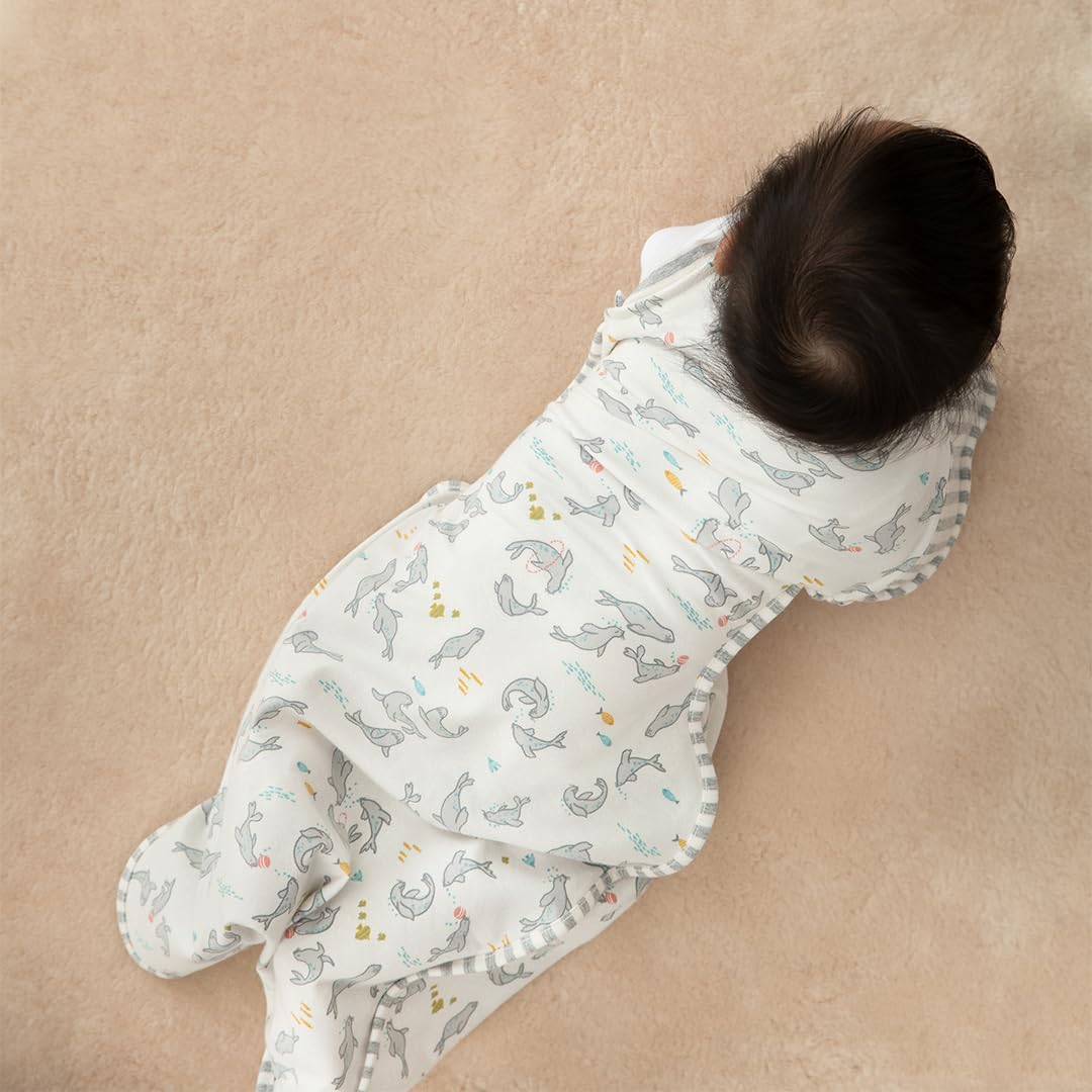 Love to Dream Swaddle Up Transition Bag Grey Seal color fits nursery decor.