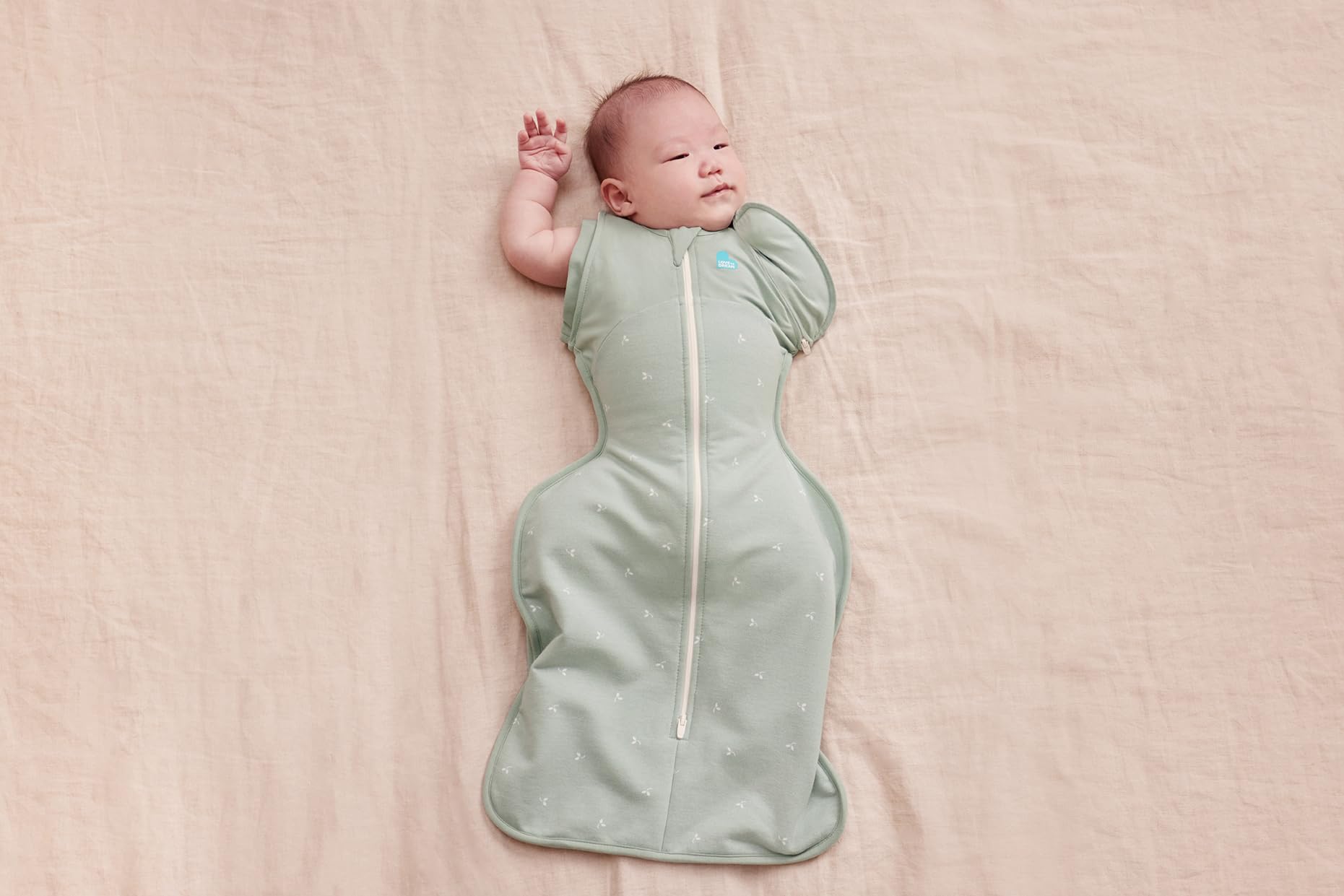 Love to Dream Swaddle Up Transition Bag Olive Twigs twin zipper for quick diaper changes.