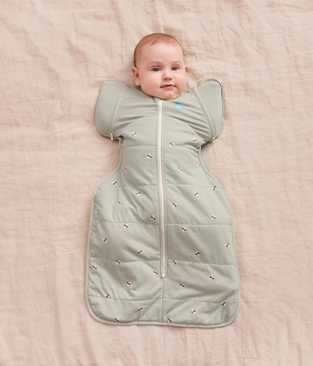 Love to Dream Swaddle Up Transition Bag pink Silly Goose keeps baby cozy in bed.