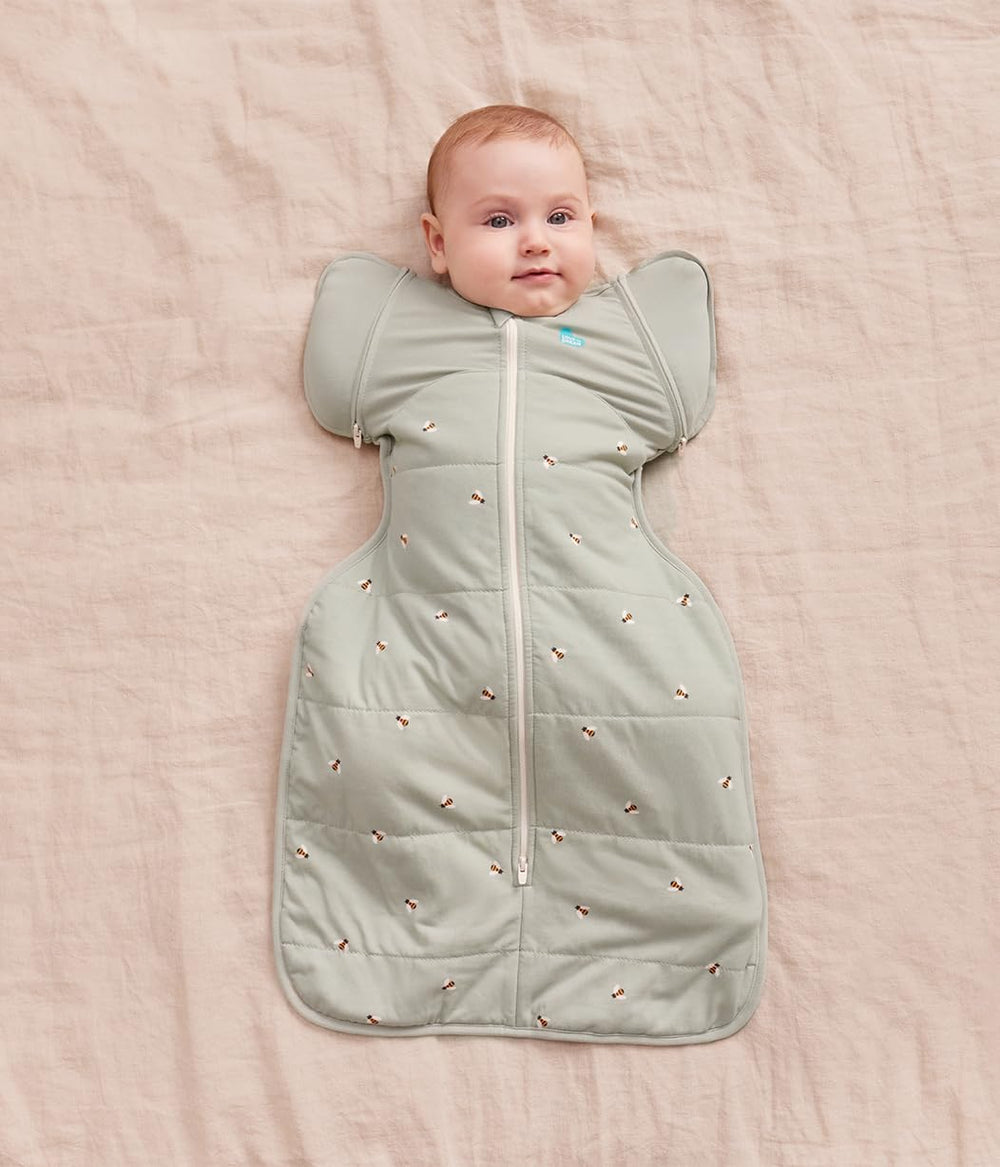 Love to Dream Swaddle Up Transition Bag pink Silly Goose keeps baby cozy in bed.