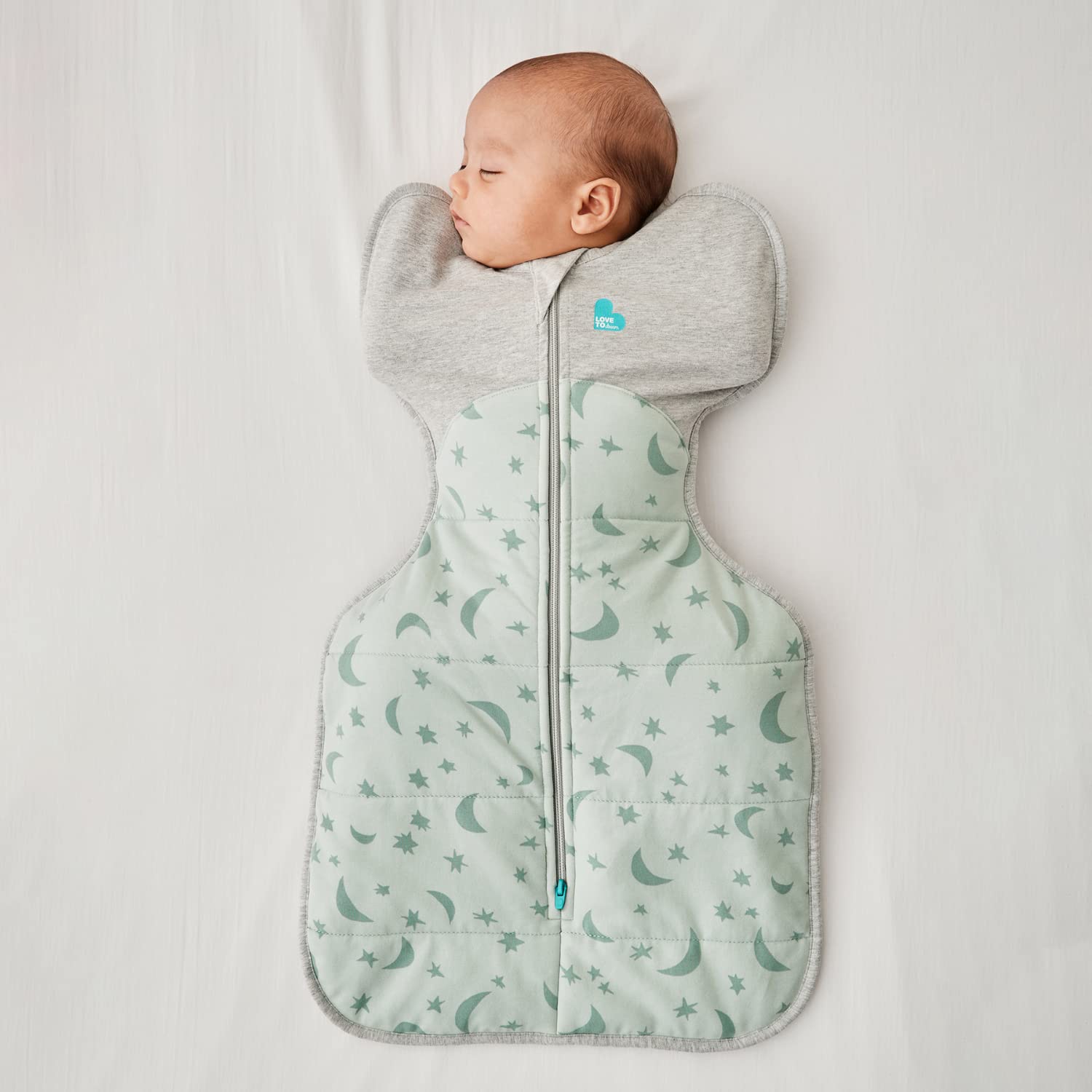 Love to Dream Swaddle UP Extra Warm olive small arms-up position enabling self-soothe