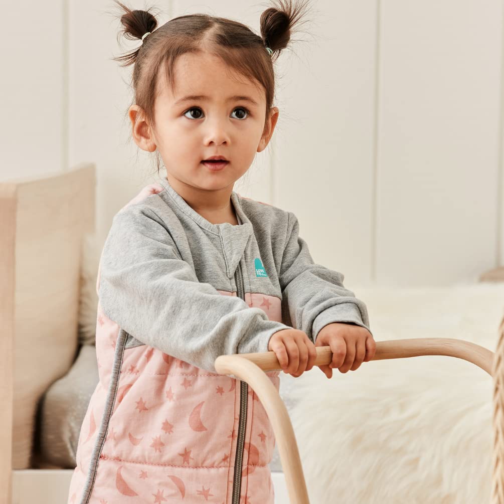 Love to Dream warm sleep suit size tag closeup confirms 6–12 months sizing.