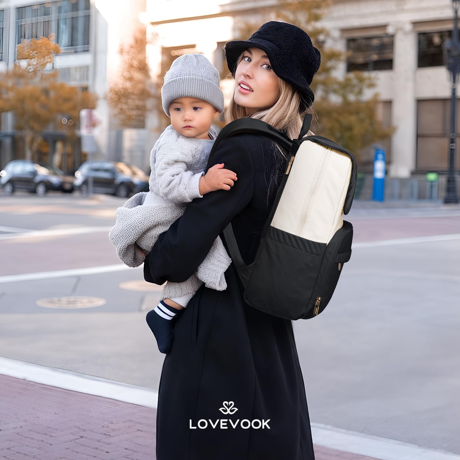 LOVEVOOK 360-degree hook secures the bag to luggage or stroller for travel.