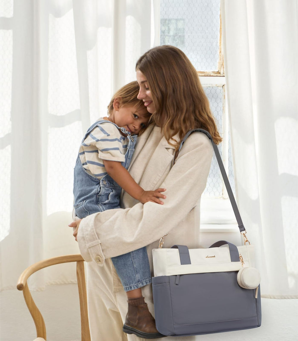LOVEVOOK luggage strap allows the bag to ride on a suitcase handle.