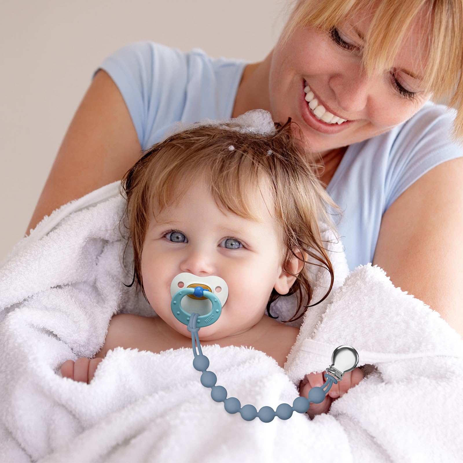 Loviomad pacifier clip supports sensory and motor development for ages 3-36 months.