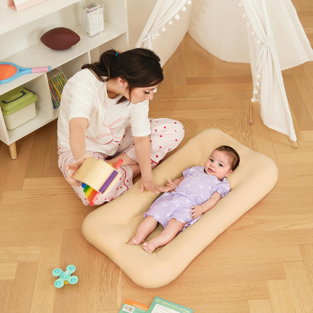 Lucakuins Baby Lounger apricot in-use during playtime supports bonding and interaction.