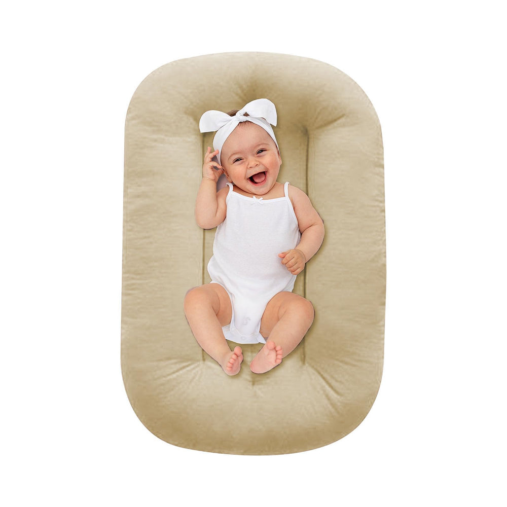 Lucakuins Baby Lounger apricot side view shows breathable organic cotton for safe lounging.