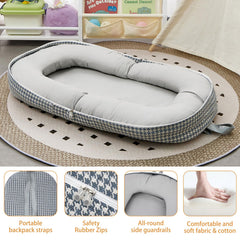 Lucakuins baby lounger laid out as a cozy awake play space