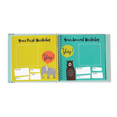 Lucy Darling Memory Book photo slots help capture yearly milestones effortlessly.