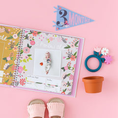Lucy Darling Little Artist Memory Book pages invite easy milestone journaling and photo recording