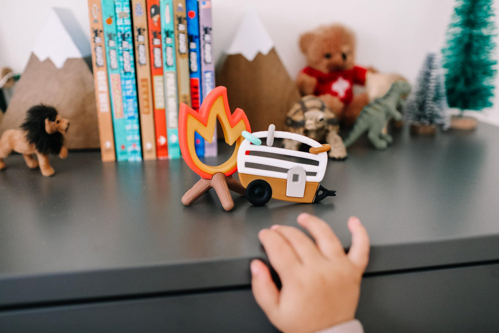 Lucy Darling Little Camper teether BPA-free silicone offers safe chewing during teething.