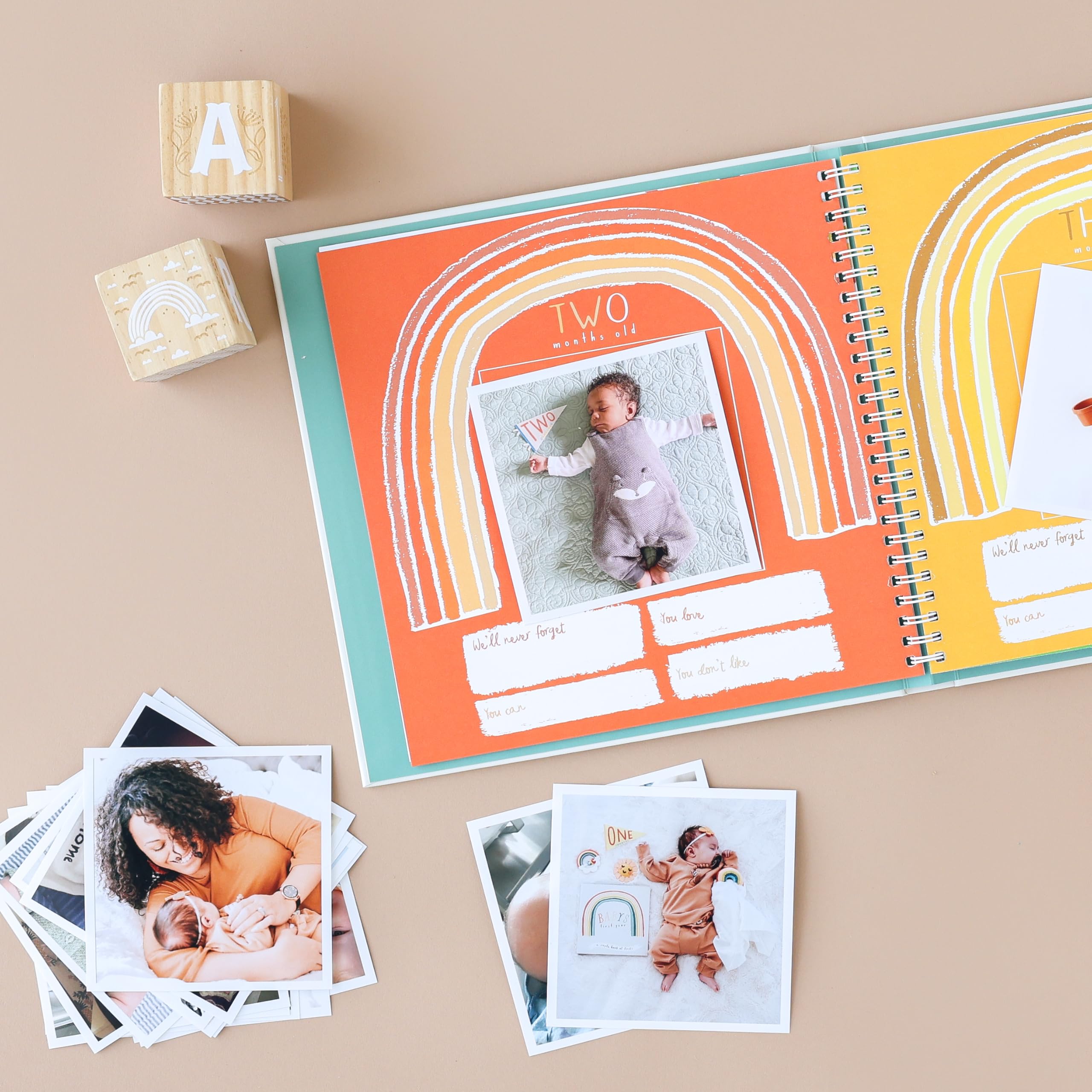 Lucy Darling Little Rainbow pages spread highlights colorful prompts and photo moments for milestones.