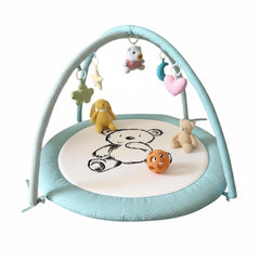 Lullaby Cotton Baby Play Gym with overhead arches for safe tummy time.