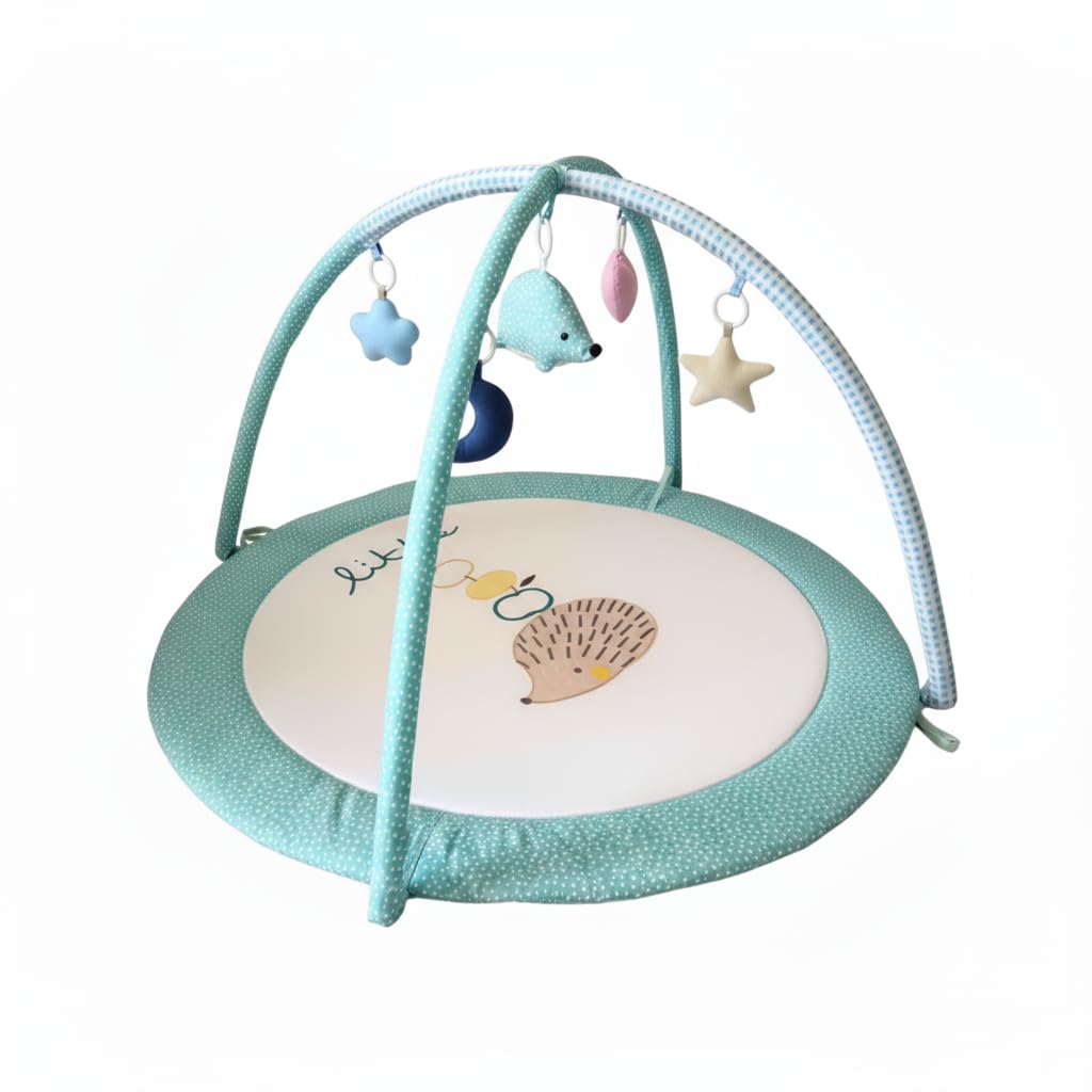 LULLABY COTTON play gym overhead arches provide a soft, safe space for newborn exploration.