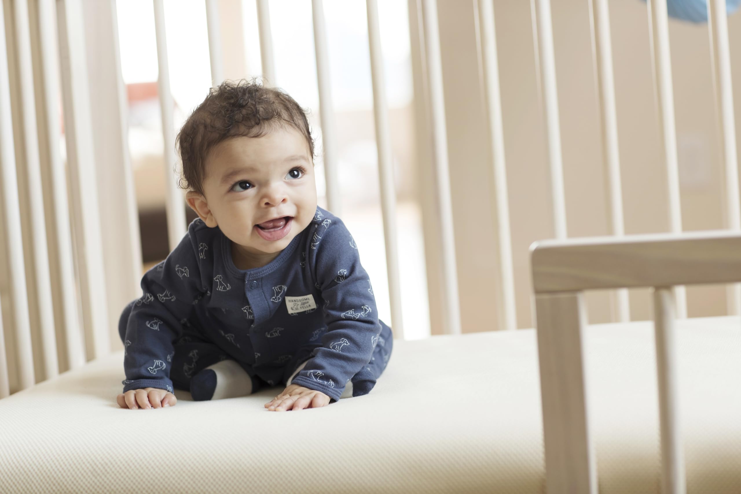 Lullaby Earth Naturepedic crib mattress cover mess protection keeps the surface clean