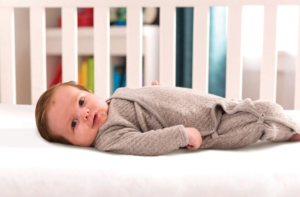 Lullaby Earth white crib mattress offers a clean, calm nursery appearance