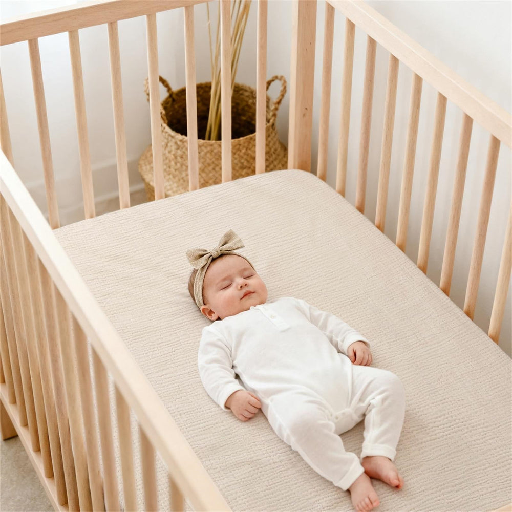 Lulu Moon Muslin crib sheet featuring 9-inch pockets for snug mattress fit
