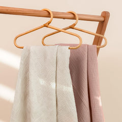 Lulu Moon Muslin crib sheet demonstrates breathable fabric for warm days