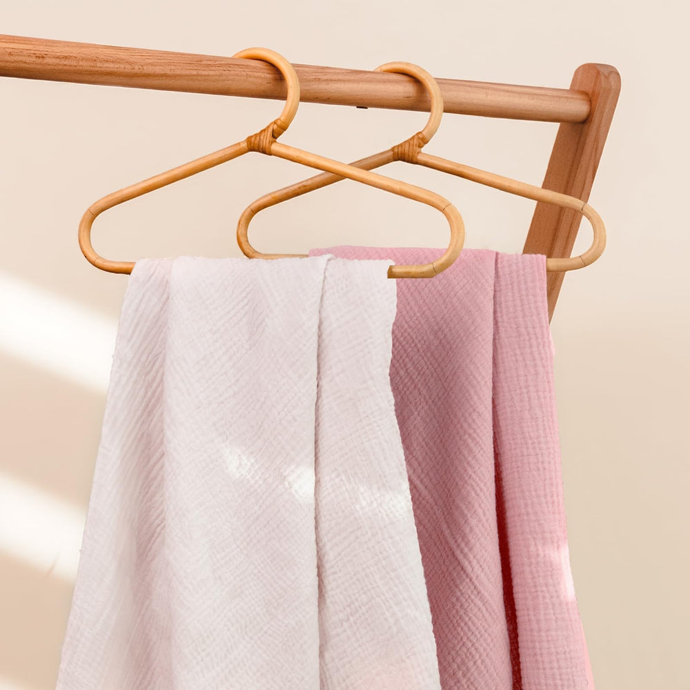 Lulu Moon muslin crib sheets 9-inch pocket close-up for secure fit.