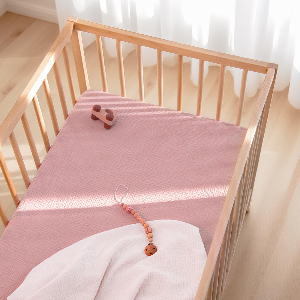 Lulu Moon muslin crib sheets machine-washable close-up for easy care.