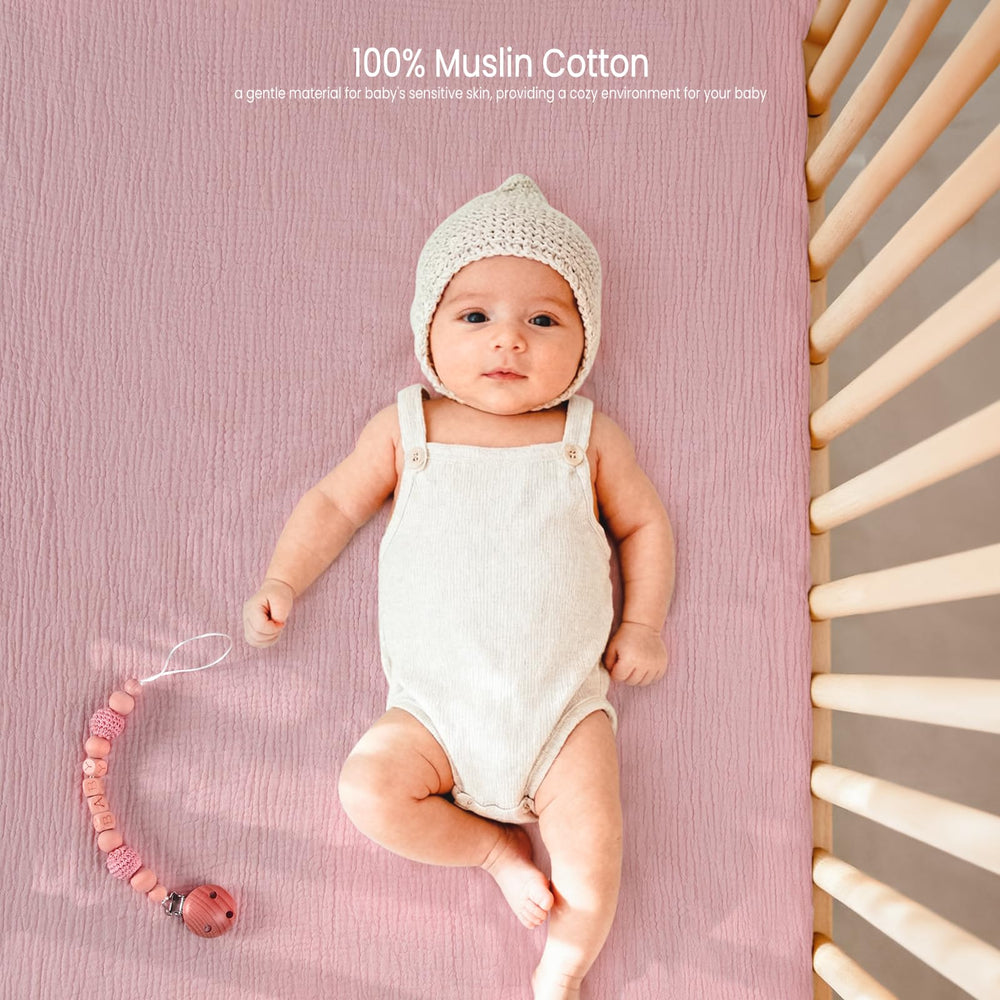 Lulu Moon muslin crib sheets two-pack close-up highlighting value.