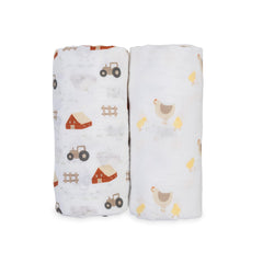 Lulujo Baby Swaddle Barn Yard print close-up shows soft breathable muslin.