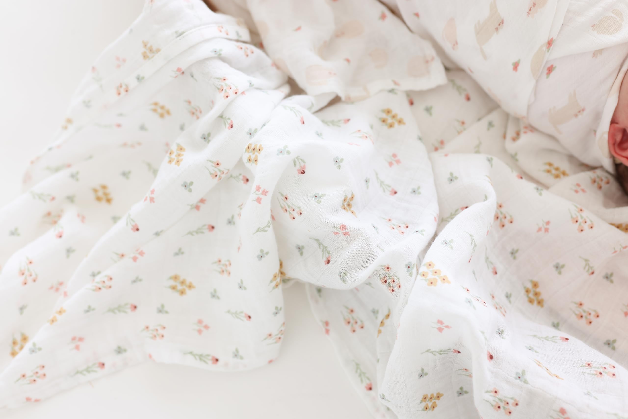 Lulujo blanket serves as a changing mat or stroller shield on the go.