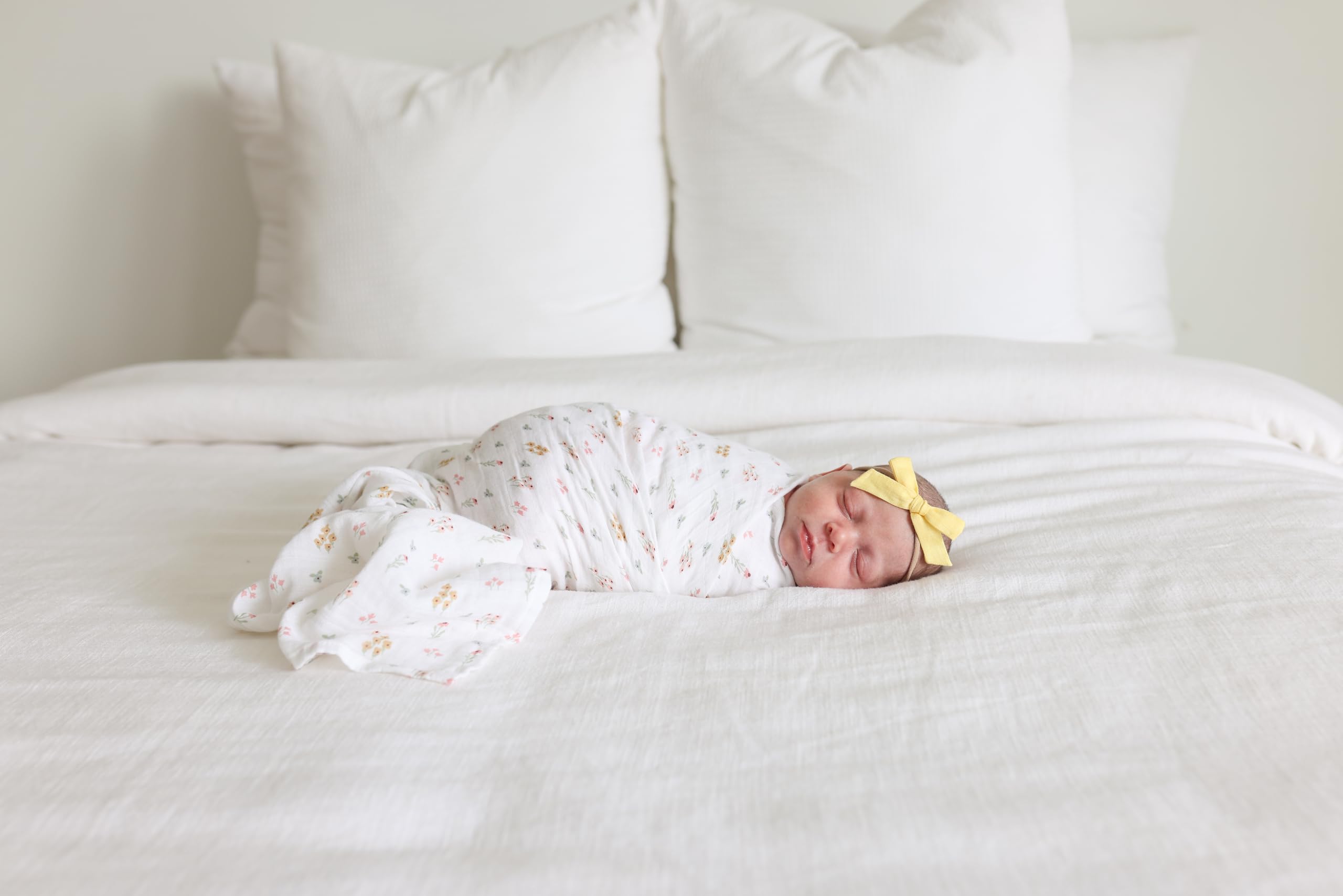 Lulujo swaddle doubles as a nursing cover for discreet feeding moments.