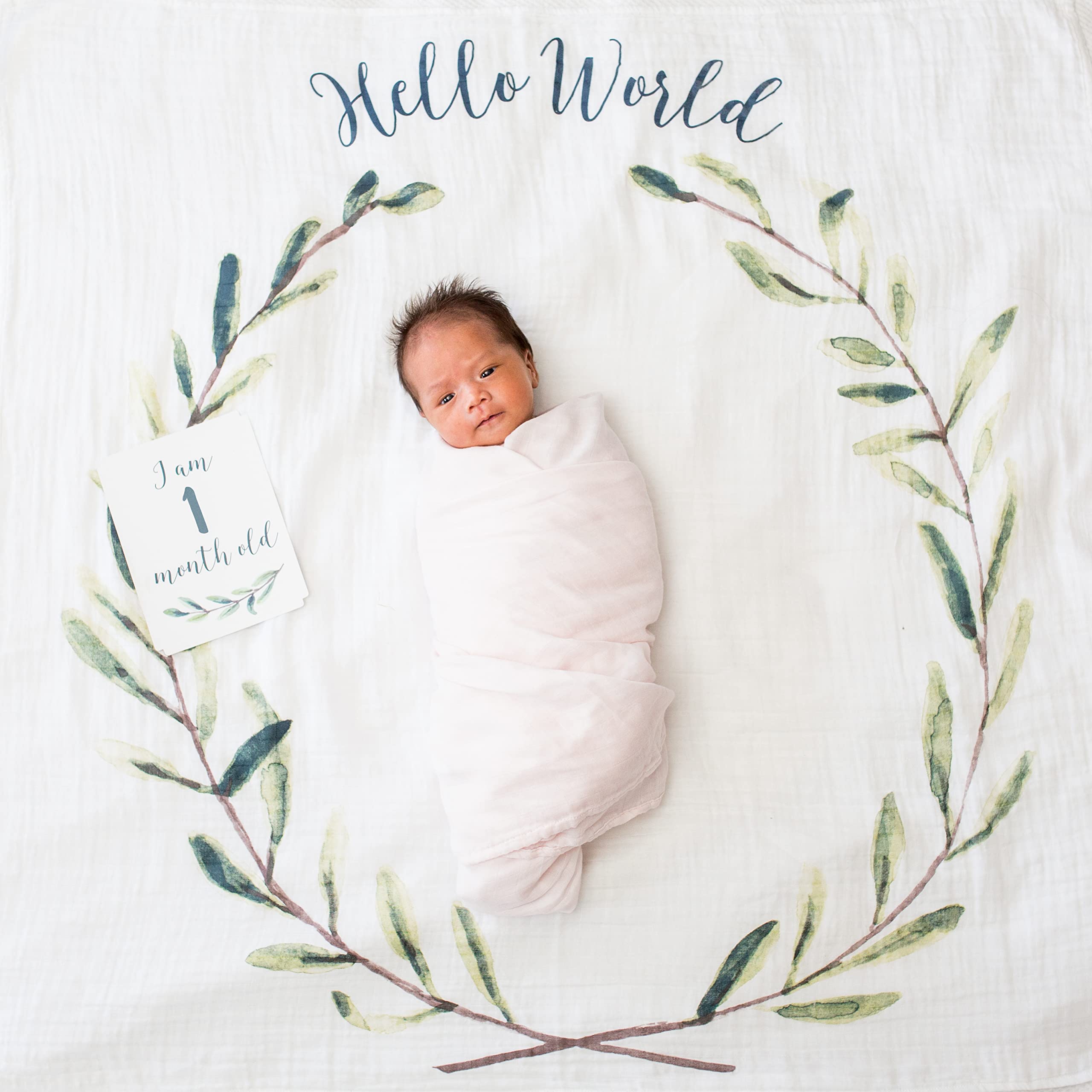 Lulujo blanket laid flat as a photogenic backdrop for milestone shots.
